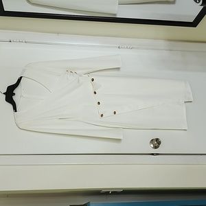 White dress with gold button details